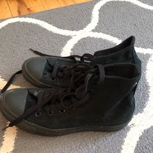 All black high top Converse